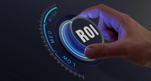 Image of hand turning a dial that says ROI on it from low to high